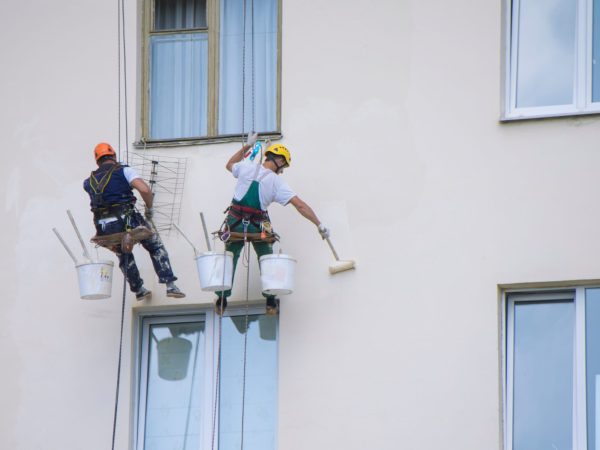 construction-workers-painting-building-exterior-a-2026-01-07-05-58-30-utc